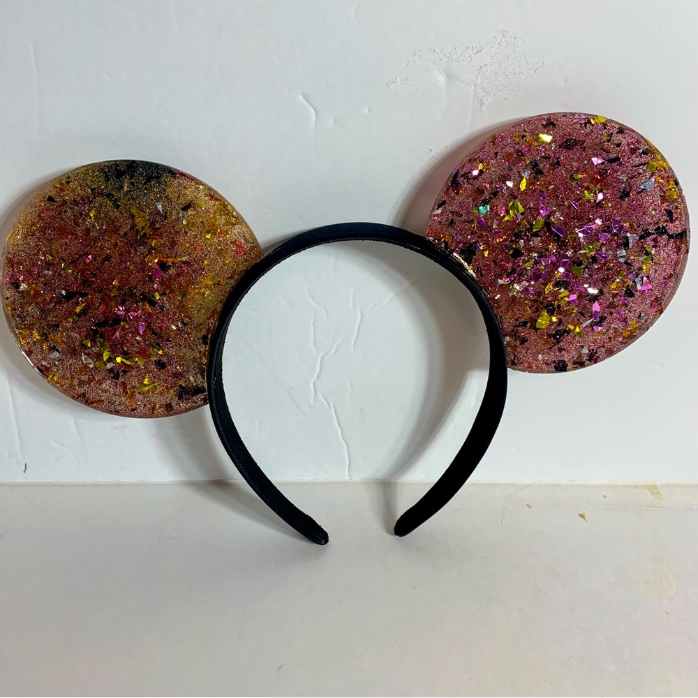 NWT. Handmade Disney-style ears. Black headband with colorful ears made of resin